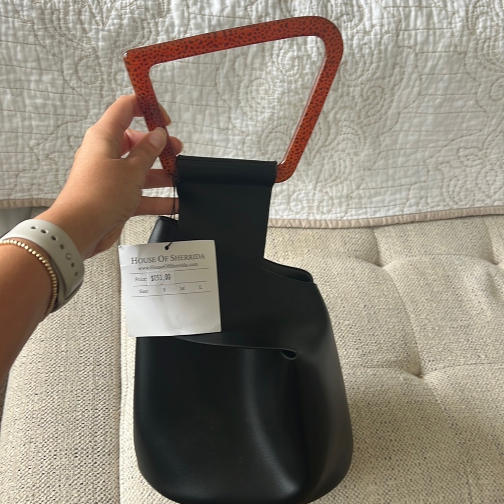 Brand new never used black leather purse/satchel